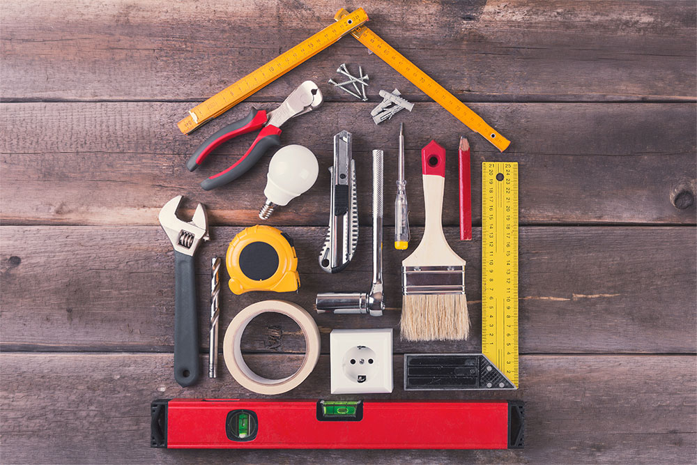 Tools laid out in a pattern of a house